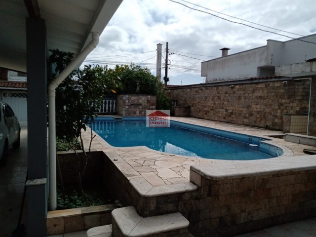 casa com dois lotes e  piscina